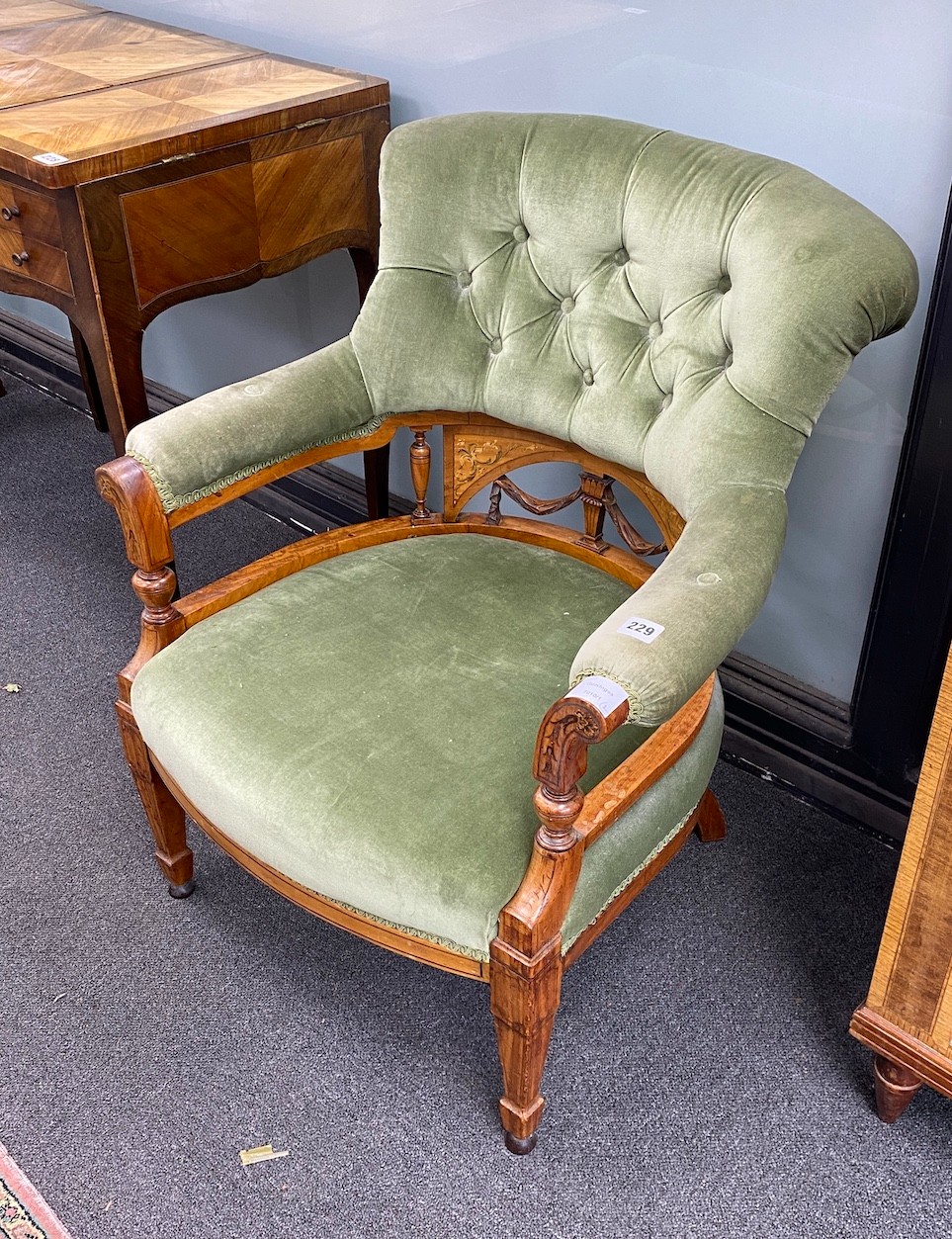 An Edwardian inlaid satinwood tub framed chair and a similar low seat chair